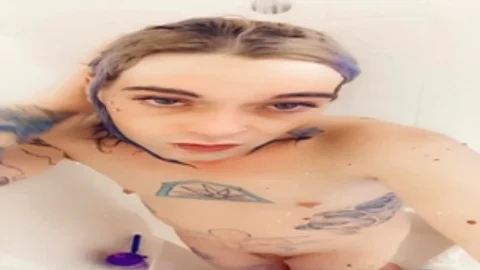 pretty cutie in nature's garb Taking A Shower