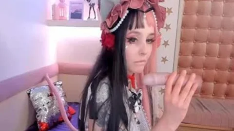 ladyboy Cosplayer Puts Rubber penis Up To The face hole